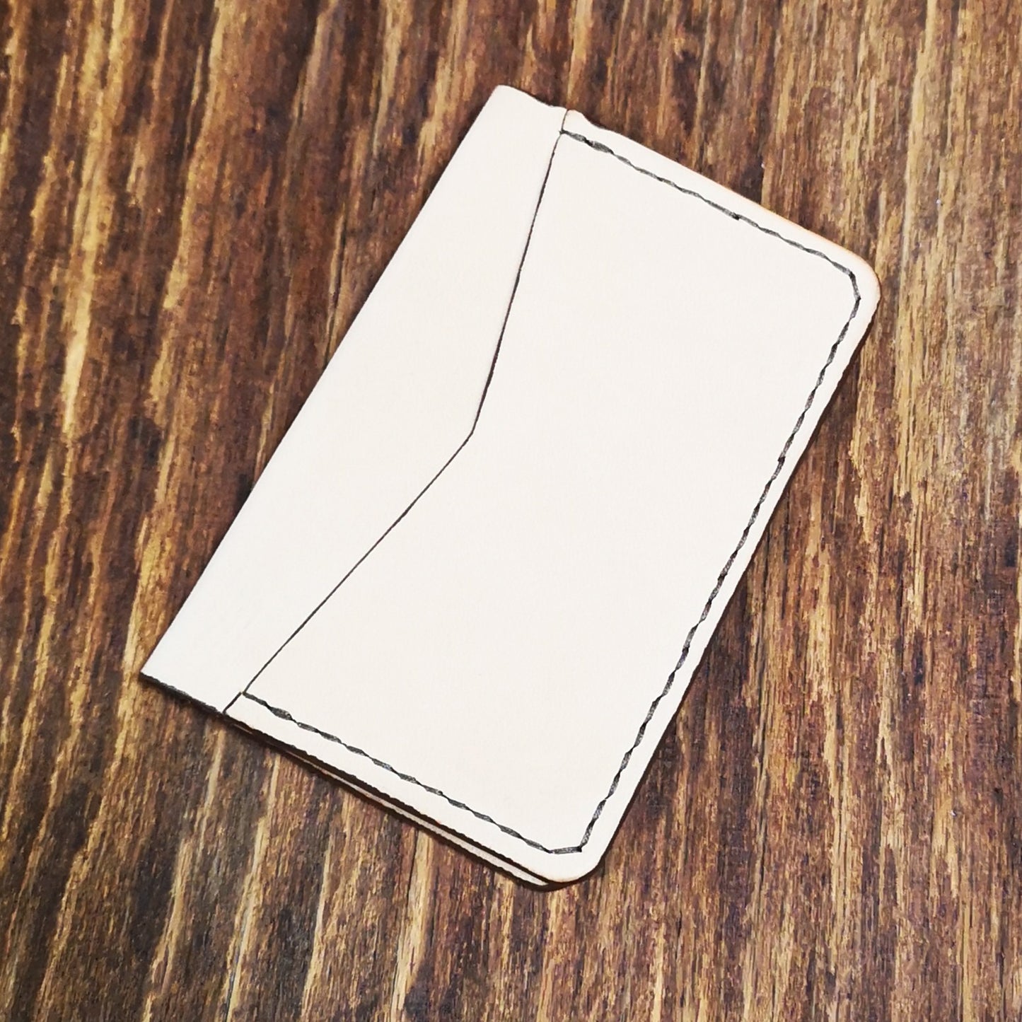Leather Bifold Card Holder – “Compact Meets Classic.”