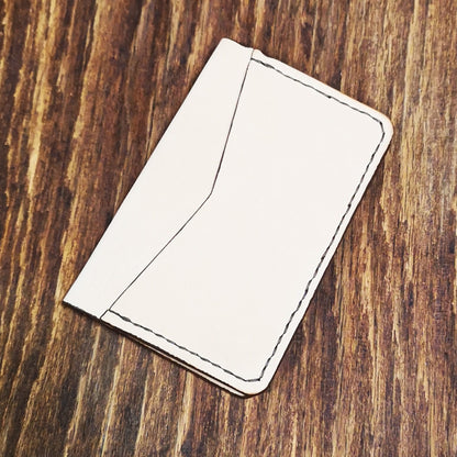 Leather Bifold Card Holder – “Compact Meets Classic.”